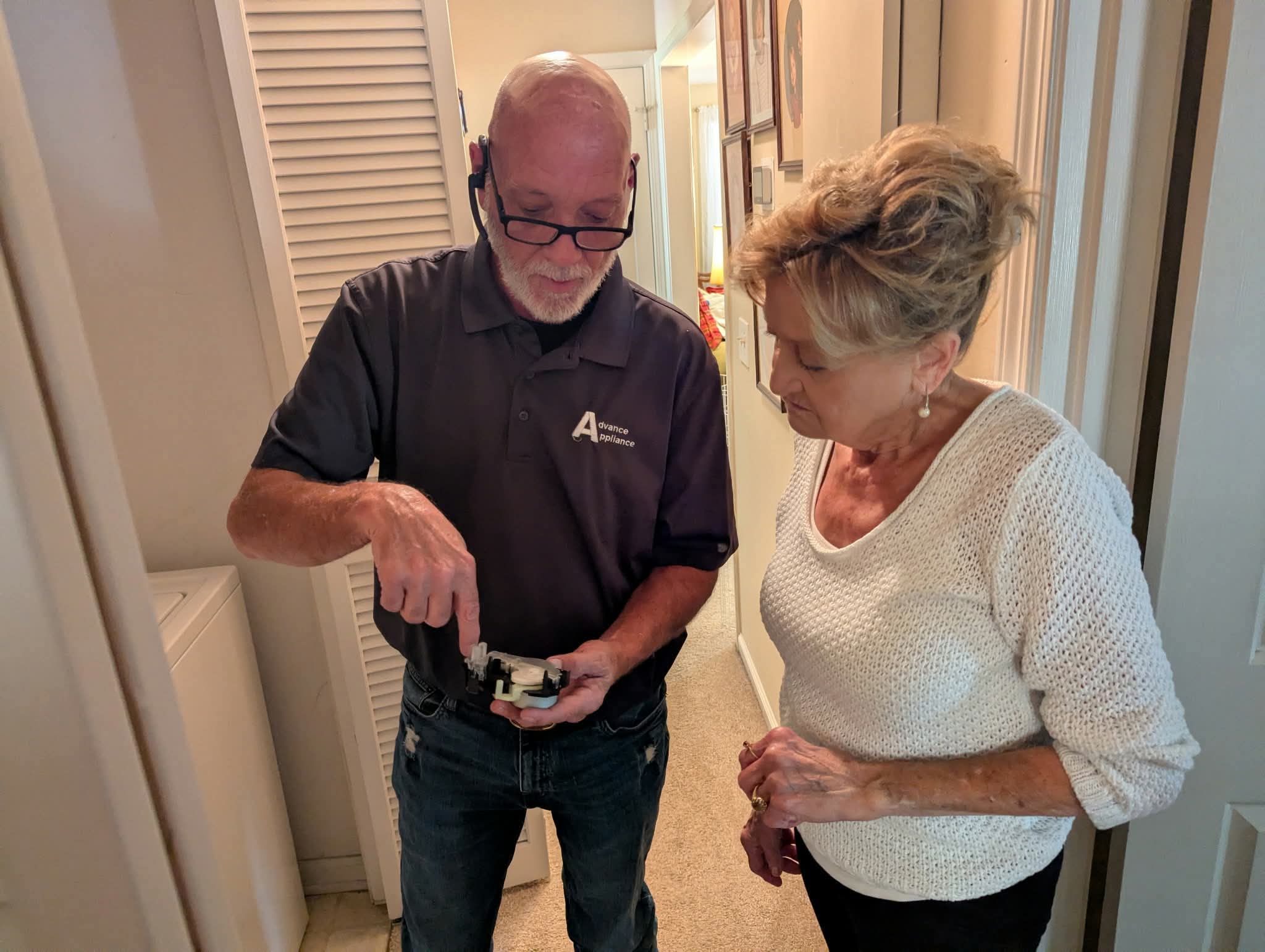 Brad Howard repairing a household appliance in Lexington, SC