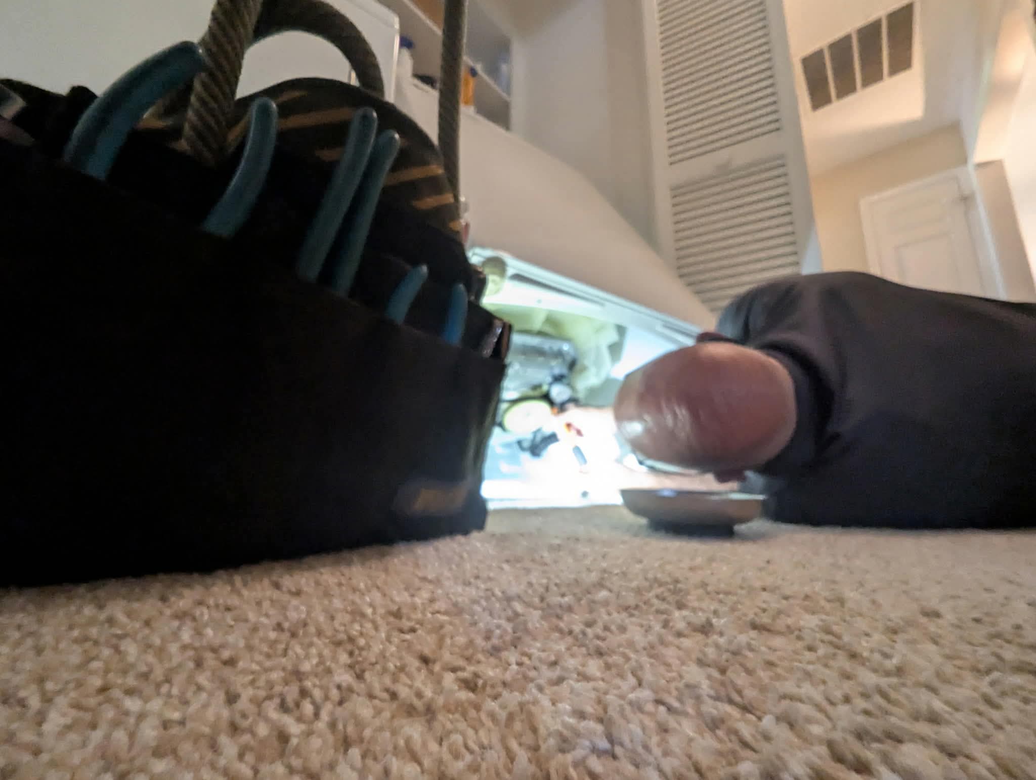 Brad Howard repairing a washer in Lexington, SC
